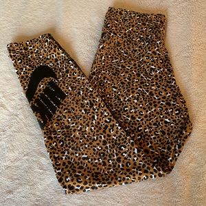 Nike leopards print leggings, size medium